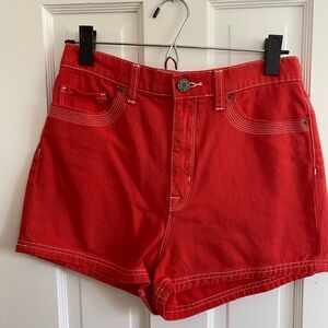 Red denim shorts w/ white topstitching